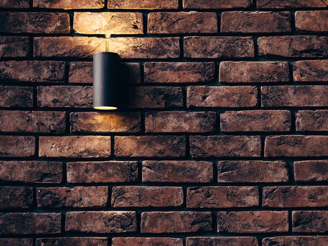 brick wall with a light on it